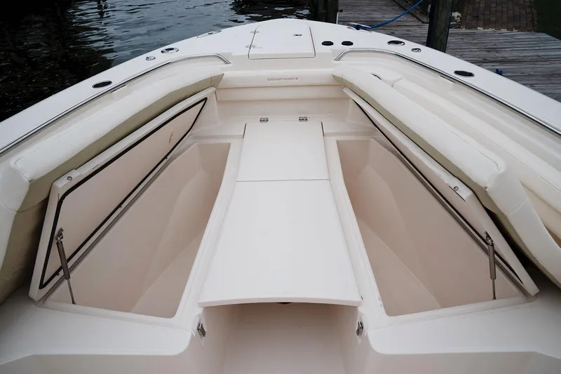  Yacht Photos Pics Manufacturer Provided Image: 2020 Grady-White Canyon 336 boat bow with open storage compartments.