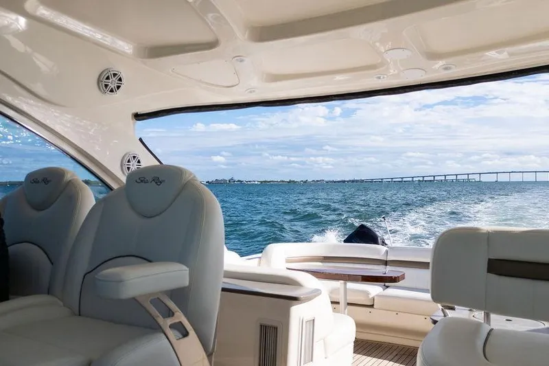  Yacht Photos Pics Interior view of 2005 Sea Ray 48 Sundancer yacht cruising on open water.