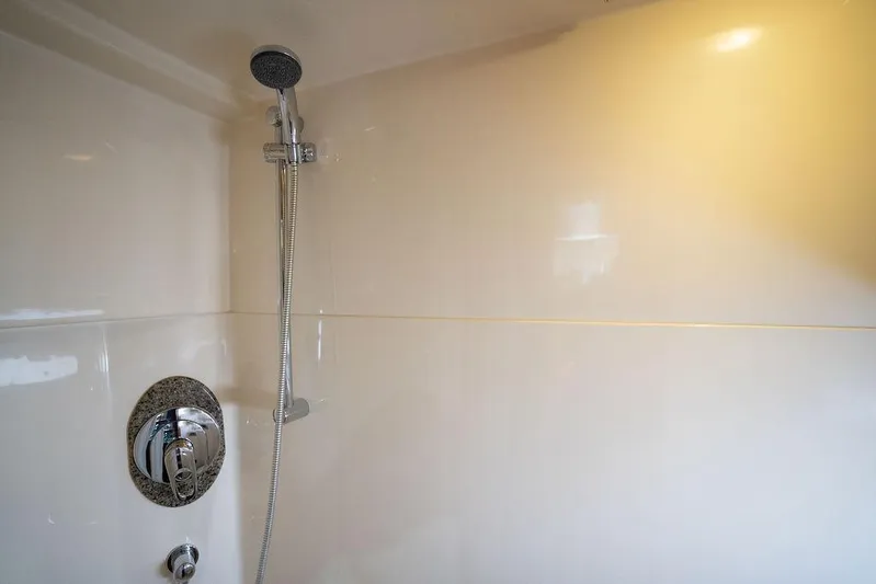  Yacht Photos Pics Shower area in 2005 Sea Ray 48 Sundancer yacht, featuring modern fixtures.