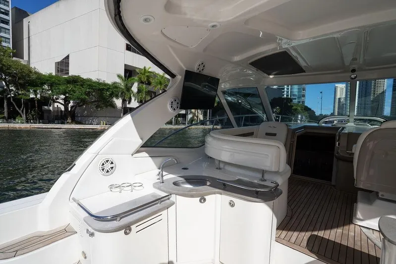  Yacht Photos Pics Luxurious 2005 Sea Ray 48 Sundancer yacht interior with sleek design and waterfront view.