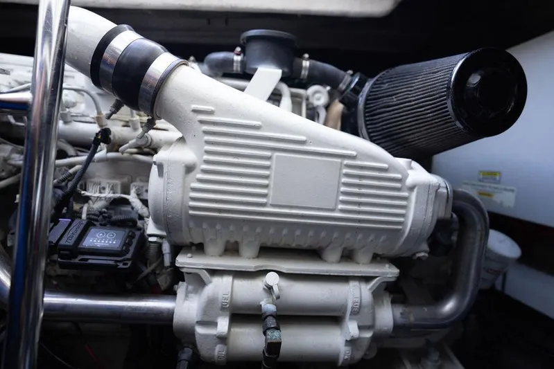  Yacht Photos Pics Engine compartment of a 2005 Sea Ray 48 Sundancer, showcasing mechanical components.