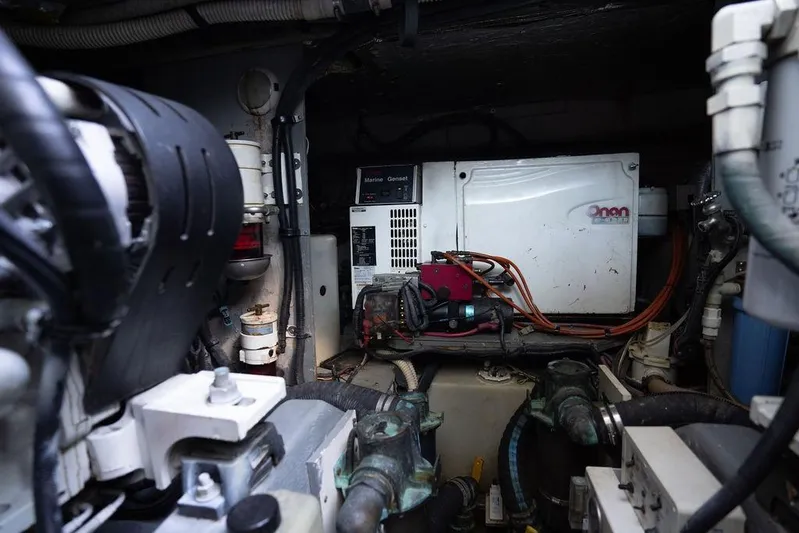  Yacht Photos Pics Engine room of 2005 Sea Ray 48 Sundancer with Onan generator and mechanical components.