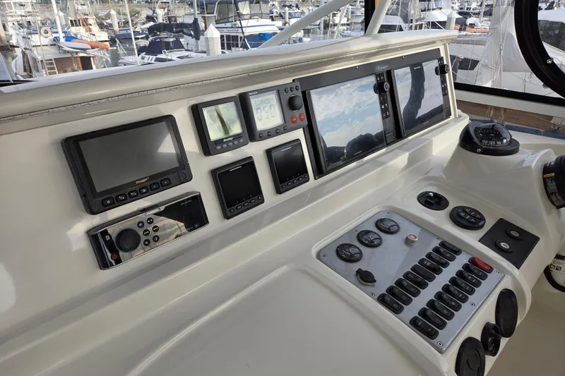 Sea Pa Yacht Photos Pics Control panel of 2007 Marquis 55 LS yacht with navigation and monitoring systems.