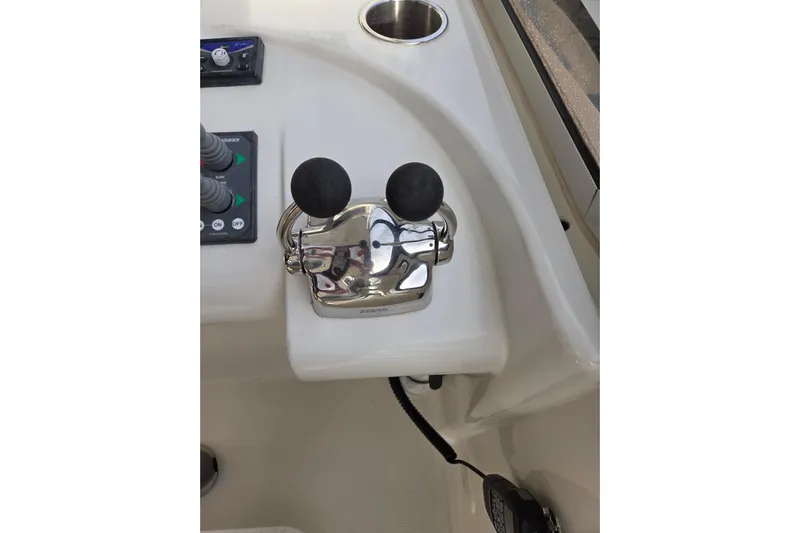 Sea Pa Yacht Photos Pics Throttle controls on a 2007 Marquis 55 LS yacht dashboard.