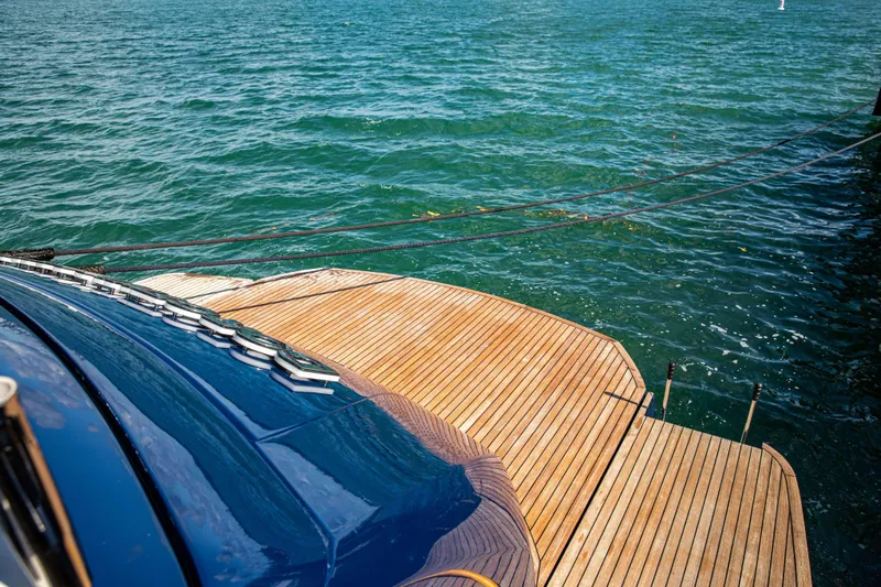 Dorothy Ann Yacht Photos Pics Luxury Pershing 82 yacht deck, 2012 model, overlooking serene blue waters.