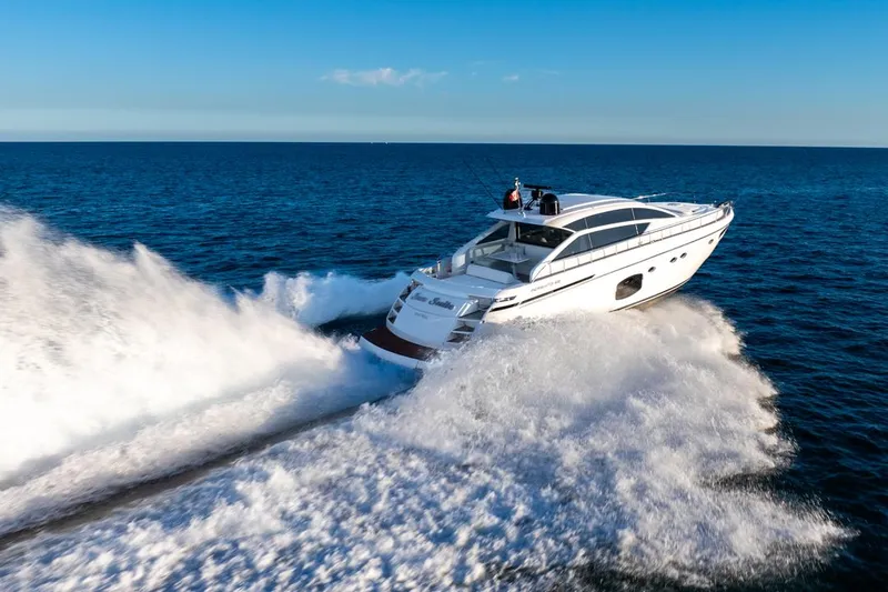Sea Suite I Yacht Photos Pics 2021 Pershing 62 yacht cruising swiftly on open sea.