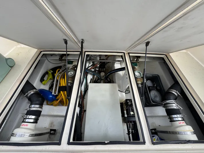 C'est La Vie Yacht Photos Pics Engine compartment of 2010 Bruckmann Bluestar 29.9 boat, showing mechanical components and wiring.