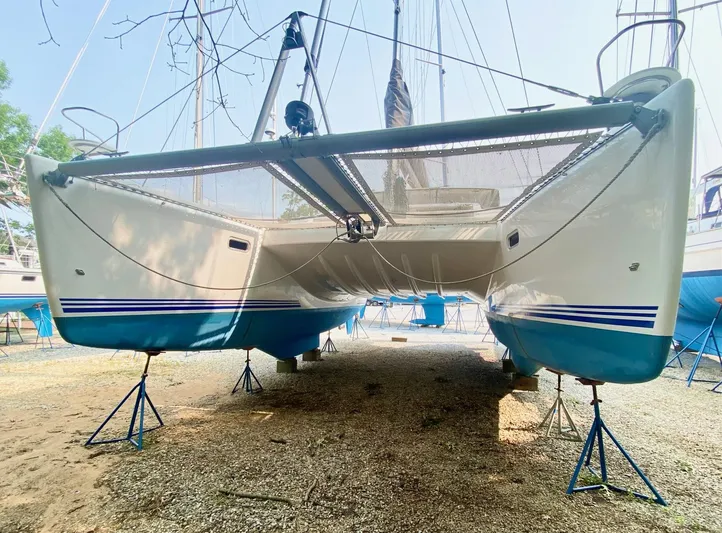 Ronin Yacht Photos Pics 2016 Celtic Yachts 40 catamaran on stands, showcasing sleek design and blue accents.