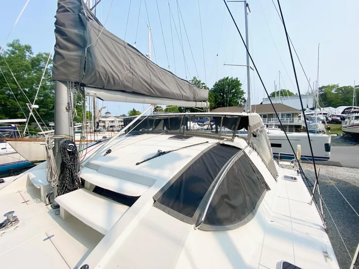 Ronin Yacht Photos Pics 2016 Celtic Yachts 40 sailboat with sleek design, docked at a marina.