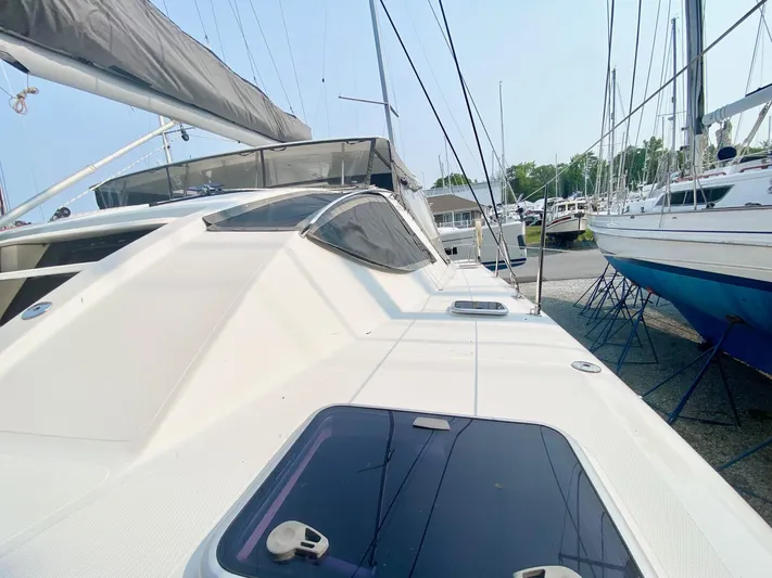 Ronin Yacht Photos Pics 2016 Celtic Yachts 40 sailboat on display at a marina, showcasing sleek design and craftsmanship.