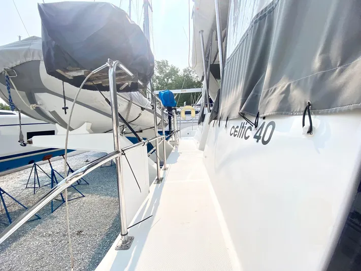 Ronin Yacht Photos Pics Celtic Yachts 40, 2016 model, docked with visible deck and railing.