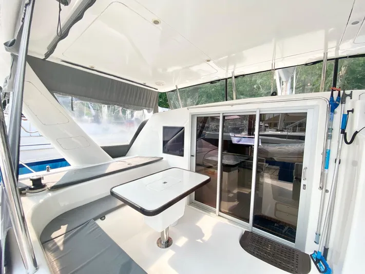 Ronin Yacht Photos Pics 2016 Celtic Yachts 40 interior with sleek design, featuring a table and sliding glass doors.
