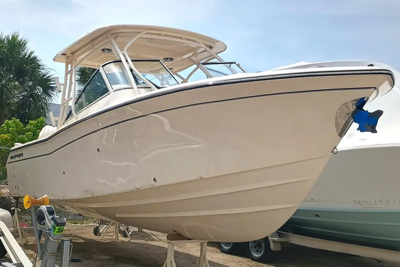  Yacht Photos Pics 2025 Grady-White Freedom 275 boat on display, showcasing sleek design and modern features.