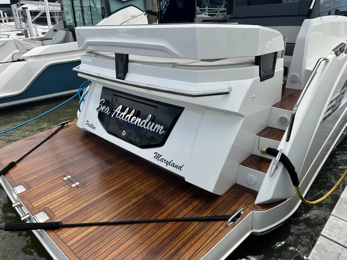 Sea Addendum Yacht Photos Pics 2021 Galeon 425 HTS yacht docked, featuring sleek design and wooden deck.