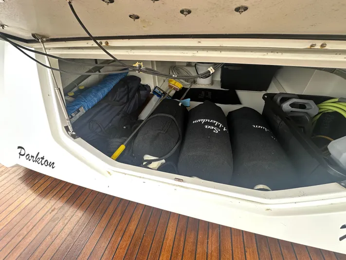 Sea Addendum Yacht Photos Pics Storage compartment of 2021 Galeon 425 HTS yacht with various equipment and supplies.
