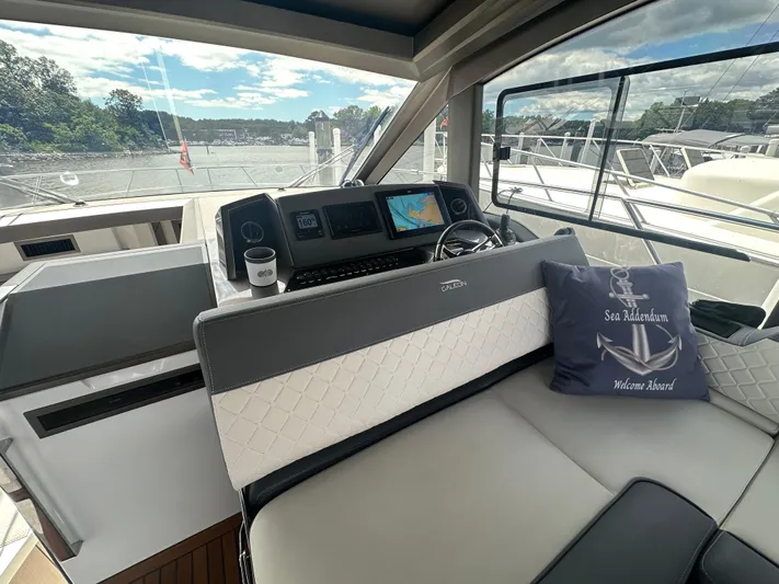 Sea Addendum Yacht Photos Pics Interior of 2021 Galeon 425 HTS yacht with modern helm and nautical decor.