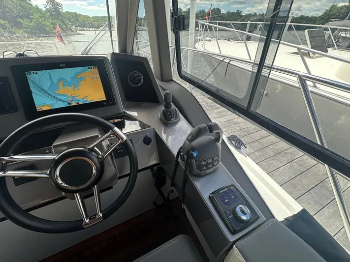 Sea Addendum Yacht Photos Pics Helm of 2021 Galeon 425 HTS yacht with navigation screen and controls.
