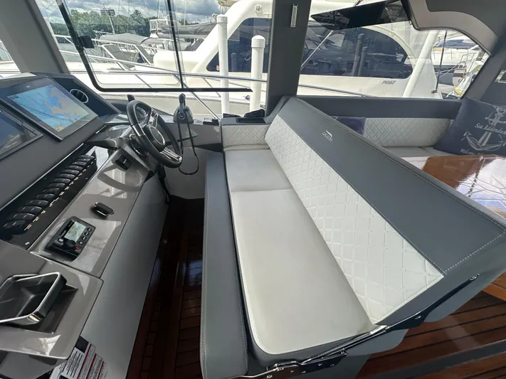 Sea Addendum Yacht Photos Pics Interior of 2021 Galeon 425 HTS yacht with modern helm and seating area.