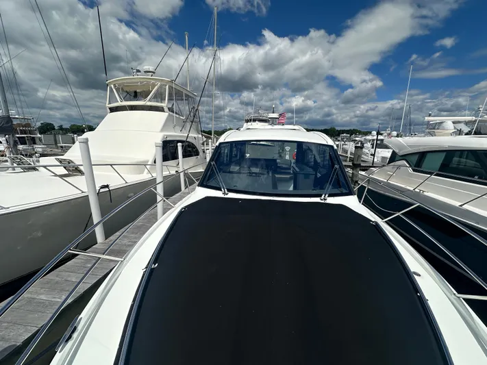 Sea Addendum Yacht Photos Pics 2021 Galeon 425 HTS yacht docked at marina under blue sky.