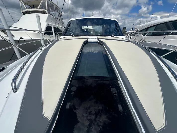 Sea Addendum Yacht Photos Pics 2021 Galeon 425 HTS yacht with sleek design, docked under cloudy skies.