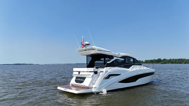 Sea Addendum Yacht Photos Pics 2021 Galeon 425 HTS yacht cruising on open water under clear blue sky.