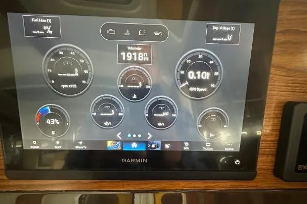  Yacht Photos Pics Garmin display on 2021 Ranger Tugs R-27 showing odometer and engine metrics.
