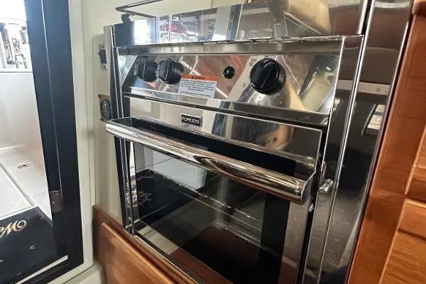  Yacht Photos Pics Stainless steel oven in 2021 Ranger Tugs R-27 boat interior.