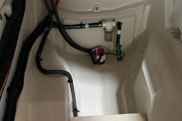  Yacht Photos Pics 2021 Ranger Tugs R-27 interior showing wiring and plumbing components.