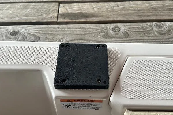  Yacht Photos Pics 2021 Ranger Tugs R-27 boat detail with black mounting plate and warning label.