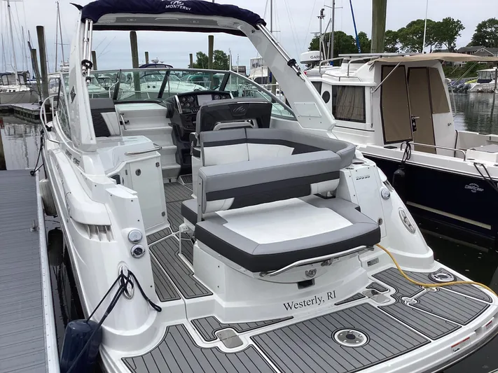 Pat.pending Yacht Photos Pics 2022 Monterey 295 Sport Yacht docked, featuring sleek design and spacious seating in Westerly, RI.