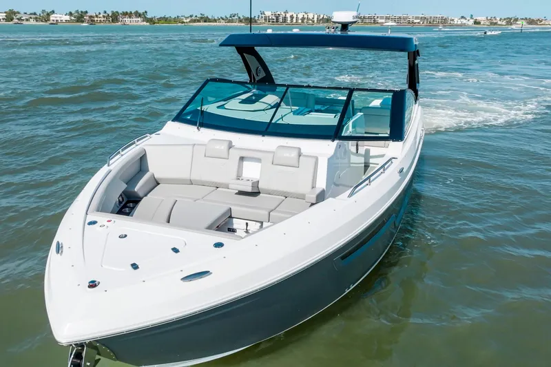  Yacht Photos Pics 2026 Cruisers Yachts 34 GLS OB on open water, showcasing sleek design and luxury features.