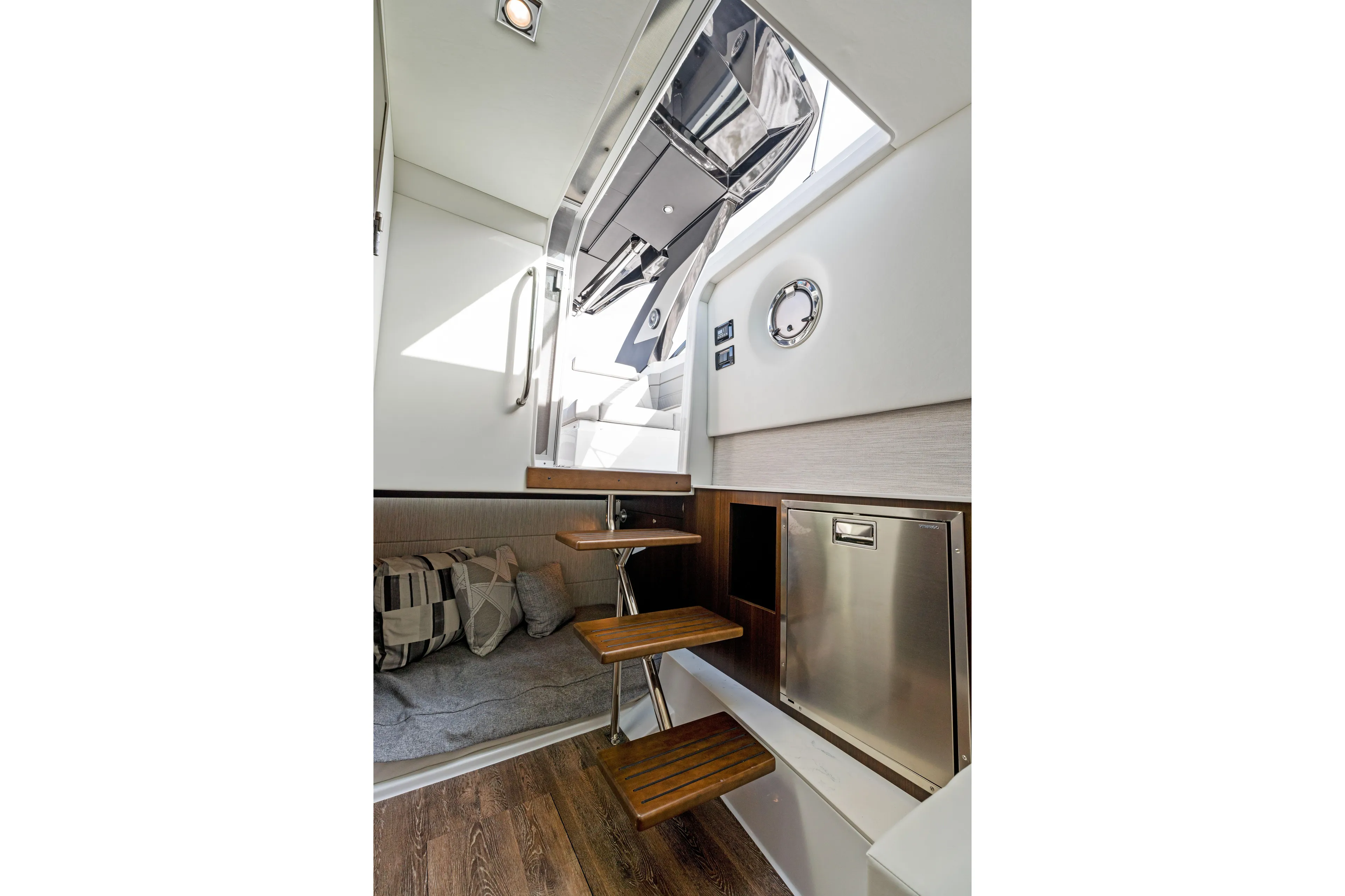  Yacht Photos Pics Interior of 2026 Cruisers Yachts 34 GLS OB, featuring stairs, seating, and modern design.