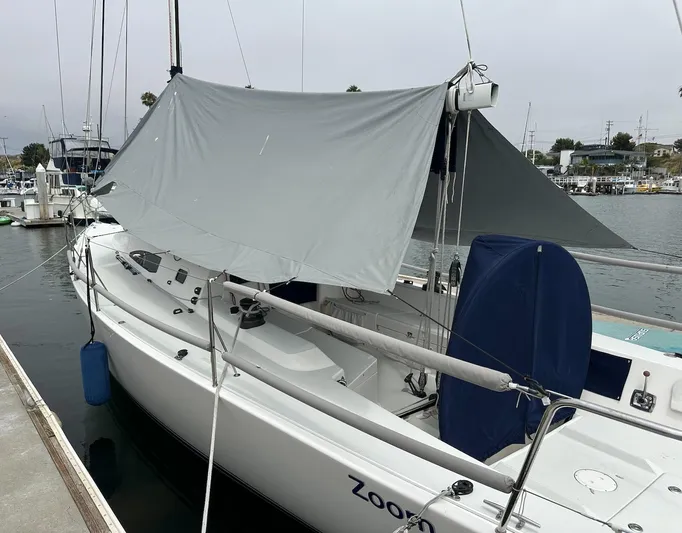 J/111 Yacht Photos Pics 2013 J Boats J/111 sailboat docked with a protective cover.