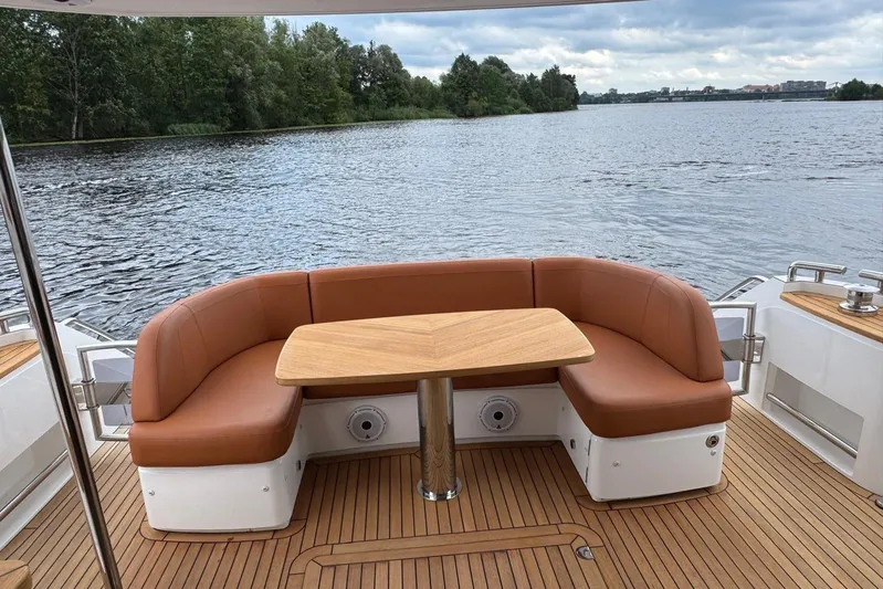  Yacht Photos Pics Luxurious seating area on 2022 Princess F50 yacht with scenic water view.