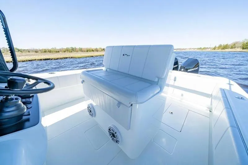  Yacht Photos Pics 2022 Contender 32 ST boat interior with white seating and water view.