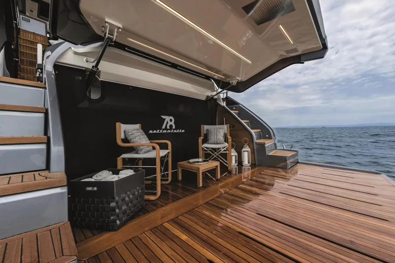  Yacht Photos Pics Luxurious 2026 Cranchi Settantotto 78 yacht deck with elegant seating and ocean view.