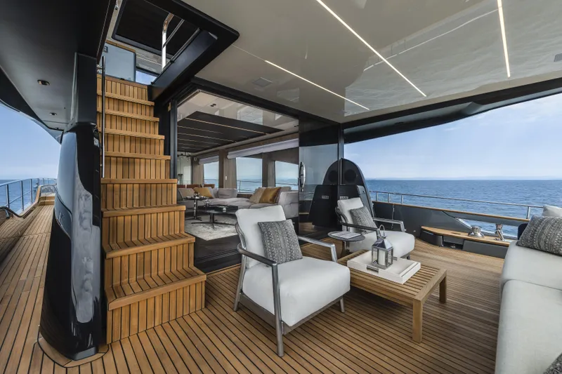  Yacht Photos Pics Luxurious 2026 Cranchi Settantotto 78 yacht interior with elegant seating and ocean view.