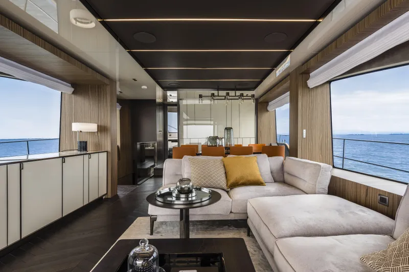  Yacht Photos Pics Luxurious interior of 2026 Cranchi Settantotto 78 yacht with modern furnishings and ocean view.