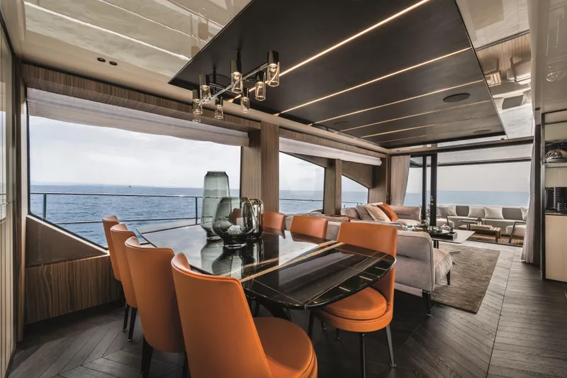  Yacht Photos Pics Luxurious interior of 2026 Cranchi Settantotto 78 yacht with elegant dining and lounge area.