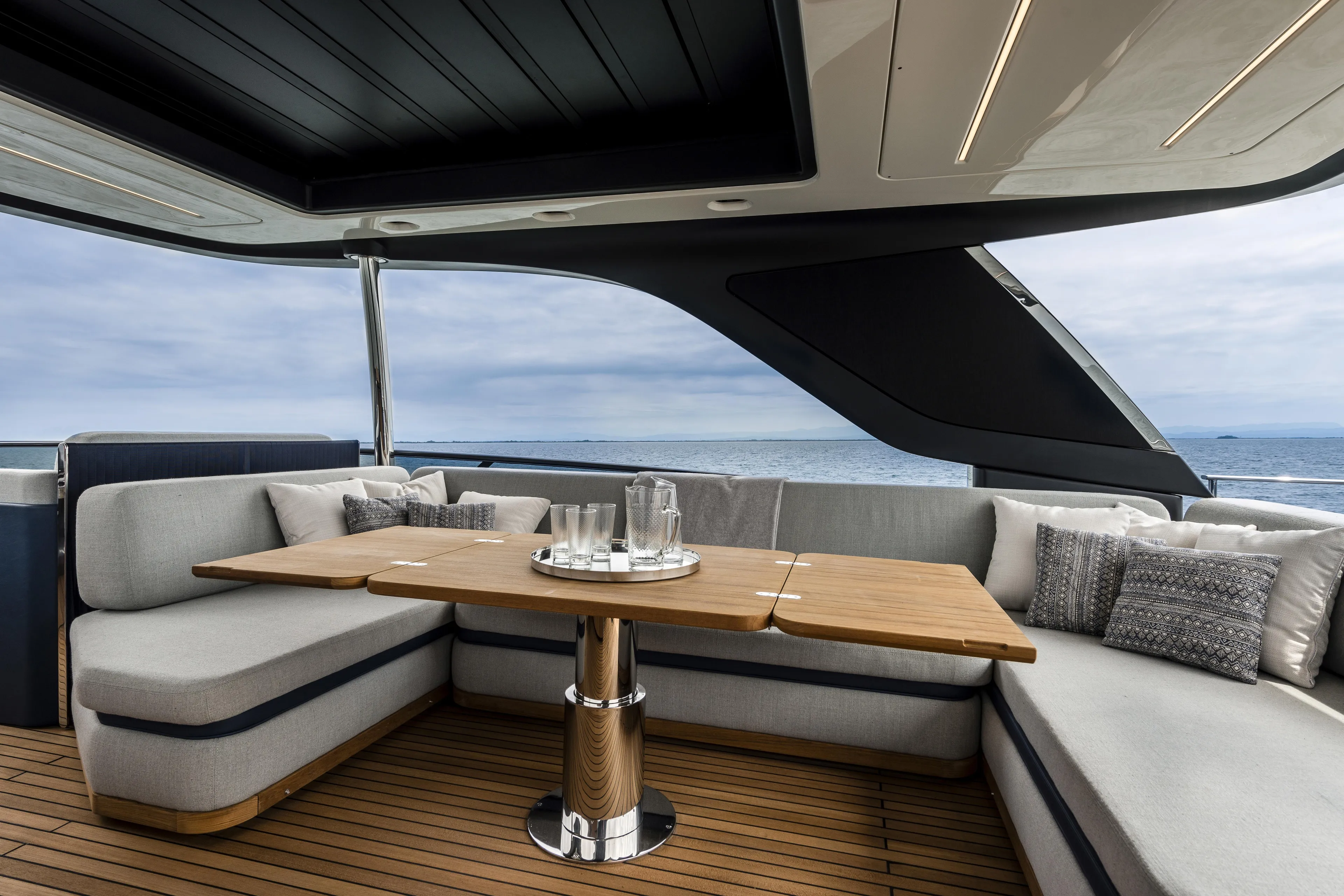  Yacht Photos Pics Luxurious 2026 Cranchi Settantotto 78 yacht interior with elegant seating and ocean view.