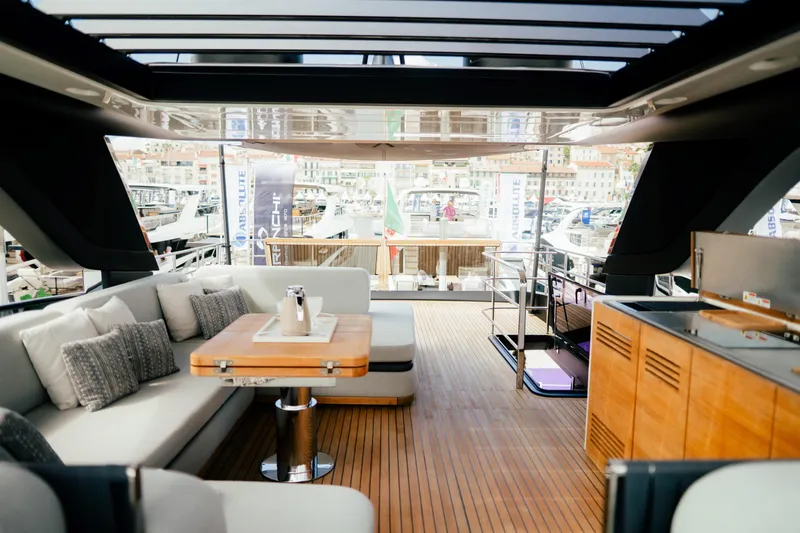  Yacht Photos Pics Luxurious interior of 2026 Cranchi Settantotto 78 yacht with elegant seating and modern design.