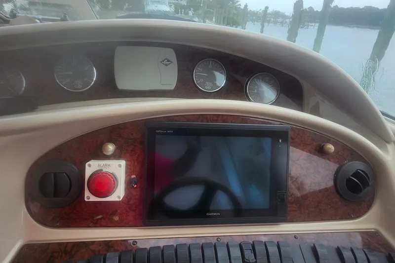  Yacht Photos Pics Dashboard of a 2004 Sea Ray 480 Motor Yacht with navigation and control instruments.