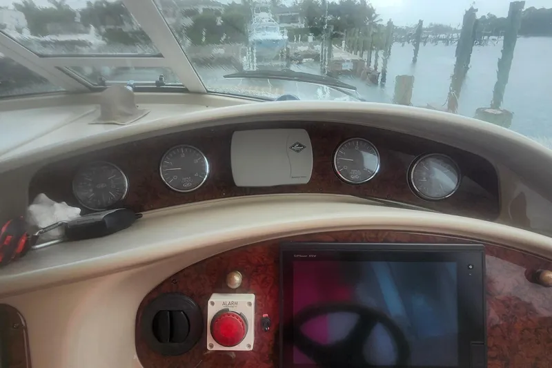  Yacht Photos Pics 2004 Sea Ray 480 Motor Yacht helm with gauges and navigation screen.