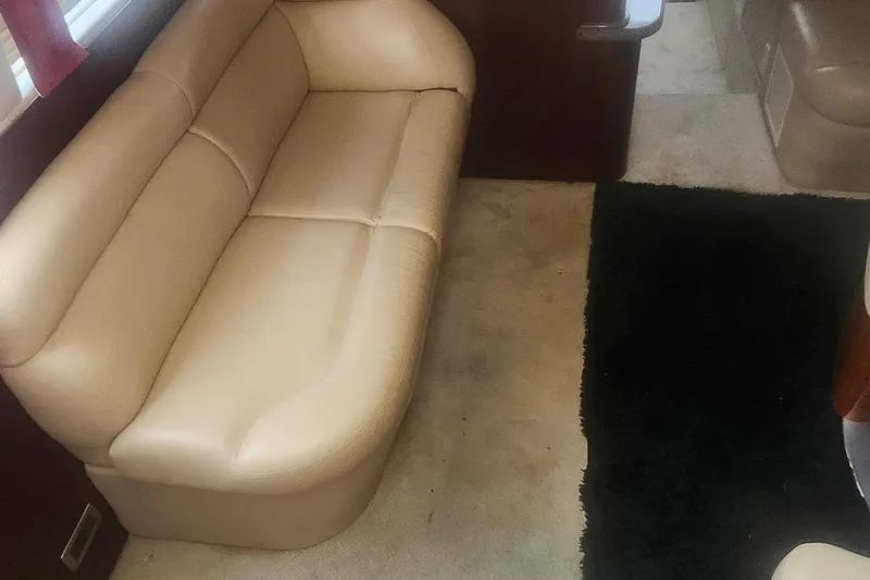  Yacht Photos Pics Interior of 2004 Sea Ray 480 Motor Yacht with beige leather seating.