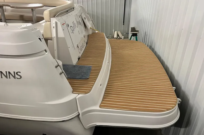 Belle Journee Yacht Photos Pics 2008 Four Winns V378 boat with wooden deck in storage.