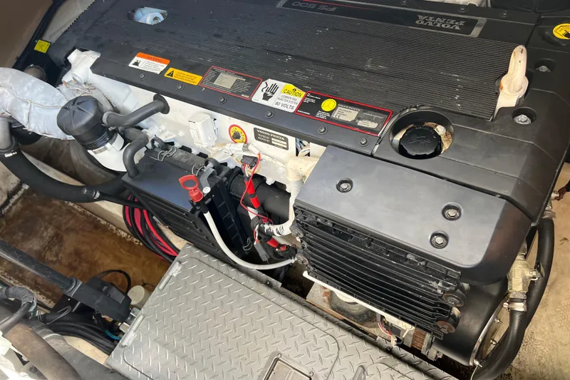 Belle Journee Yacht Photos Pics Engine compartment of a 2008 Four Winns V378 boat, featuring a Volvo Penta engine.