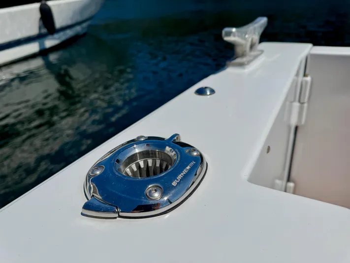 Nirvana Yacht Photos Pics 2020 Coastal Craft 33 Express boat detail with stainless steel fitting and cleat.