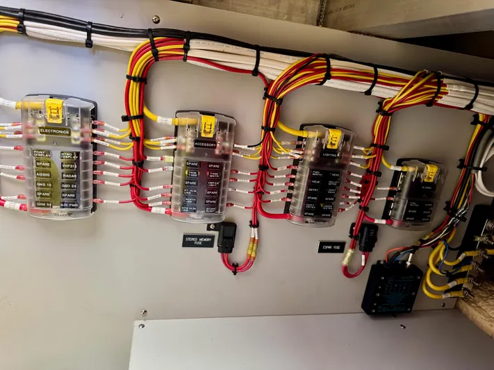 Nirvana Yacht Photos Pics Electrical panel with organized wiring in a 2020 Coastal Craft 33 Express boat.