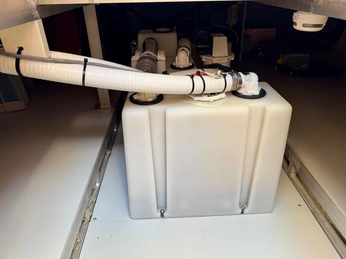 Nirvana Yacht Photos Pics Engine compartment of 2020 Coastal Craft 33 Express with visible tank and hoses.