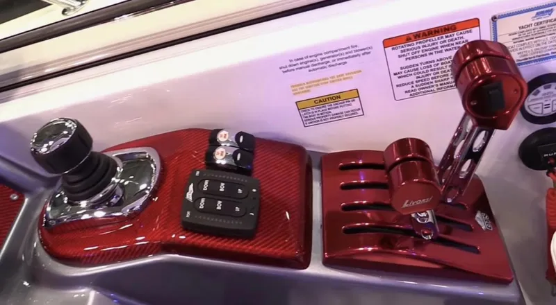  Yacht Photos Pics Control panel of a 2015 Formula 400 FX8 boat with joystick and throttle levers.